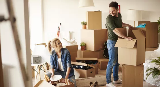 couple enter new apartment
